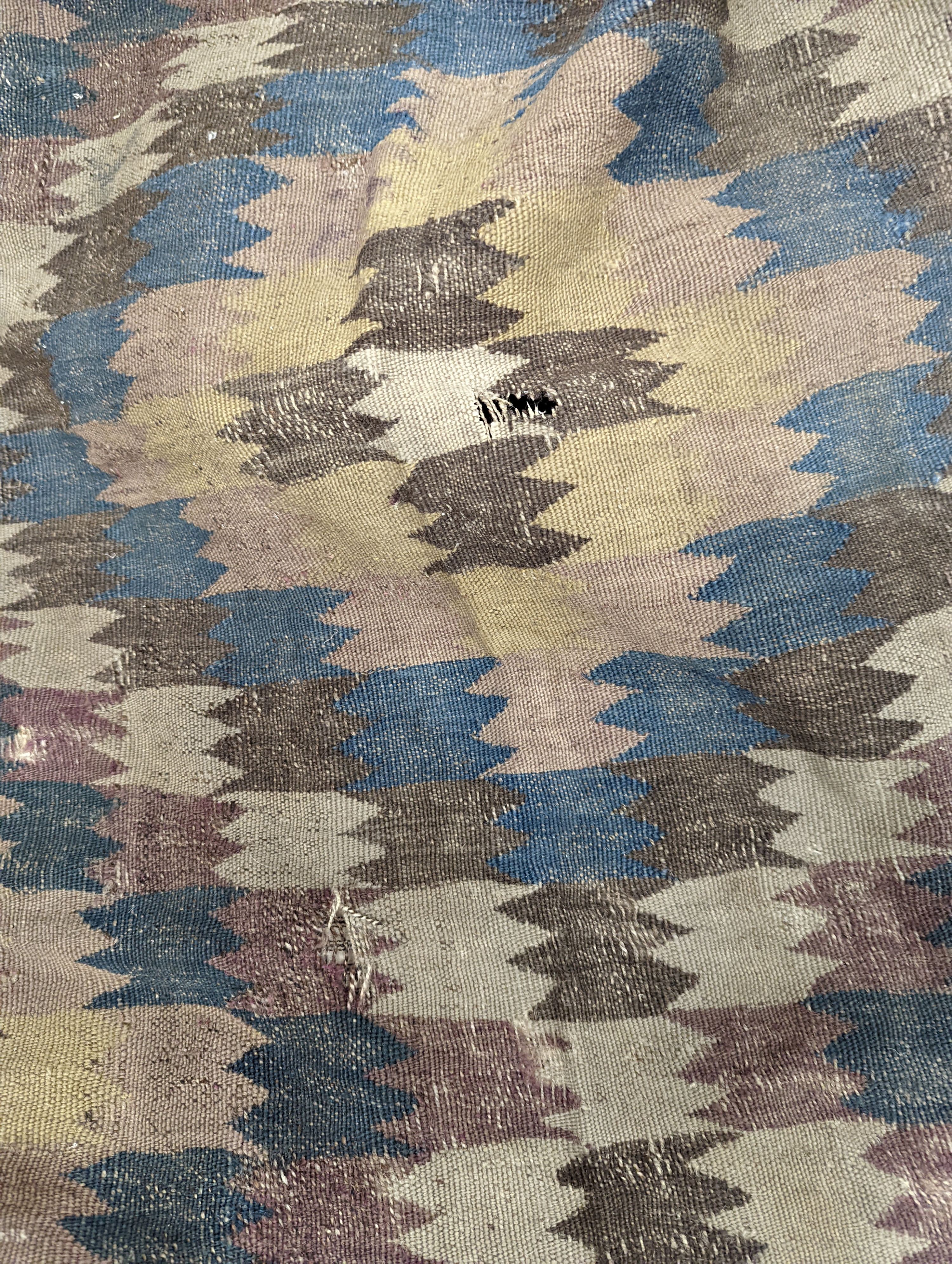 An antique Veramin Kilim hall carpet, 337 x 150cm